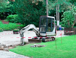 Small Excavator Working In The Park